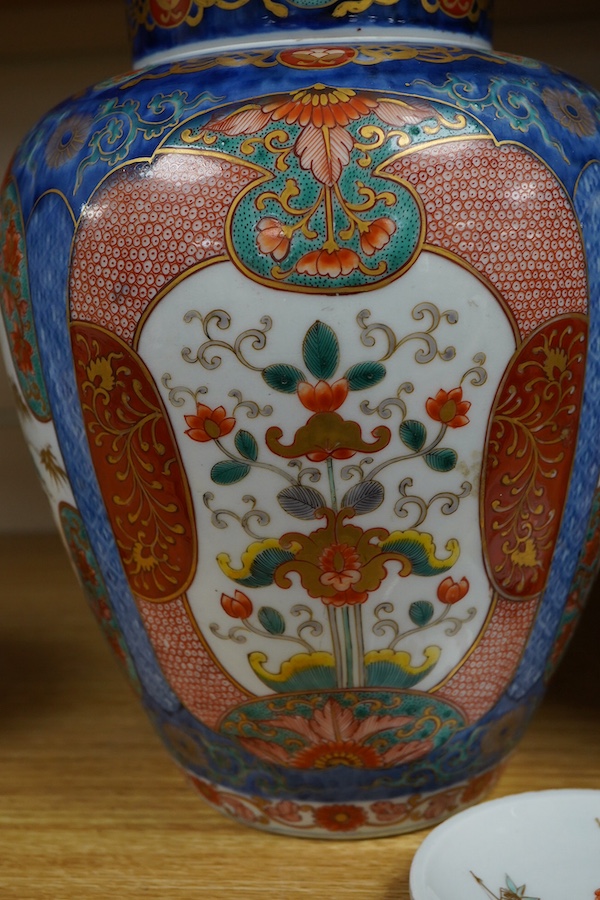 A pair of Japanese Fukagawa Imari vases and covers, with internal covers, one cover, koransha mark, 25cm